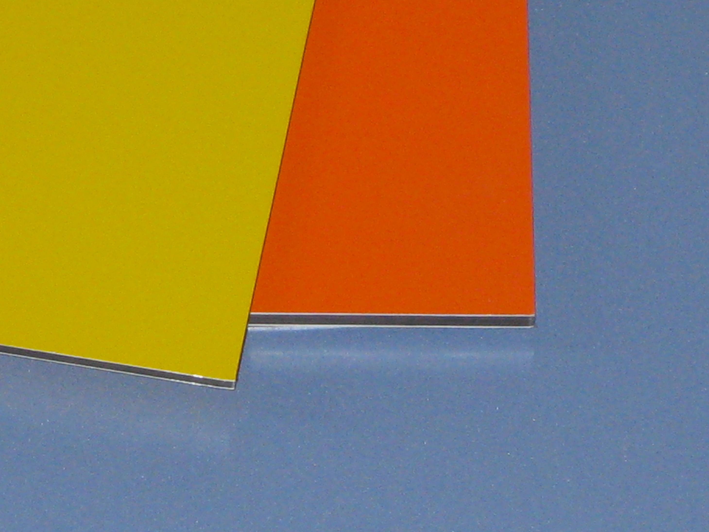 Aluminum composite panel samples with exposed layered edges