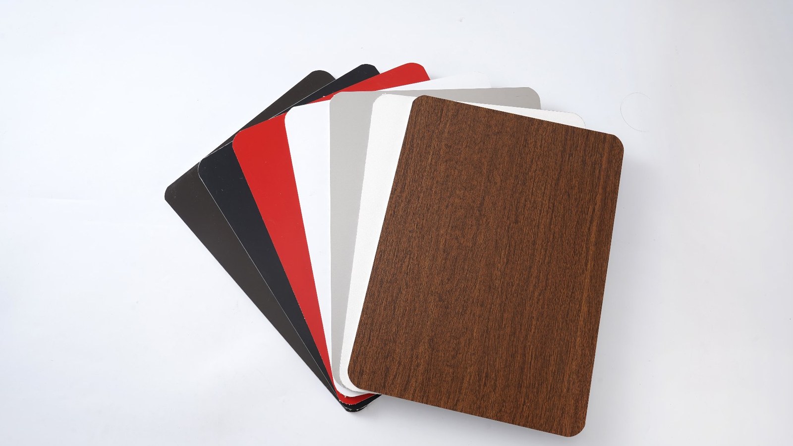 Full color card fan — solid colors, metallics and wood grains from the ALUCOVERBOND color library